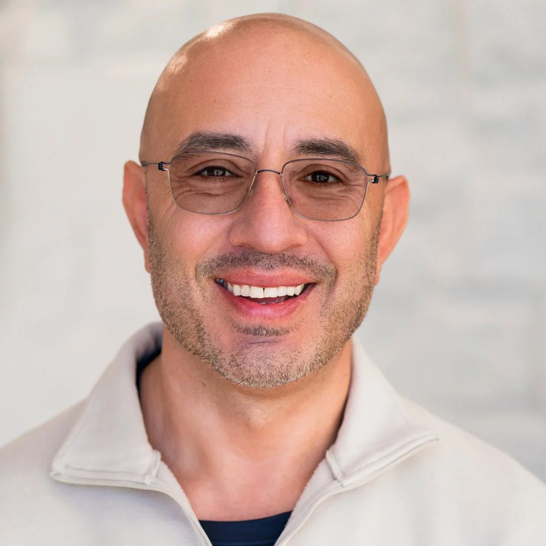 Arthur Palochak, President of APN DFW, smiling in a light-colored jacket, showcasing leadership in addiction treatment and rehabilitation services.